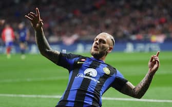epa11218956 Inter's Federico Dimarco celebrates after scoring the 0-1 goal during the UEFA Champions League round of 16 second leg soccer match between Atletico de Madrid and FC Inter, in Madrid, Spain, 13 March 2024.  EPA/Kiko Huesca