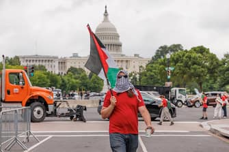 epa11494473 Protesters against the Israeli operations in Gaza and US weapons sales to Israel gather on the day of the visit of Prime Minister of Israel Benjamin Netanyahu on Capitol Hill in Washington, DC, USA, 24 July 2024. Netanyahu's address to a joint meeting of the US Congress comes amid a close 2024 US presidential election cycle. Thousands of pro-Palestinian protesters were expected to gather near the US Capitol when Netanyahu becomes the first leader to address the US Congress four times.  EPA/AARON SCHWARTZ