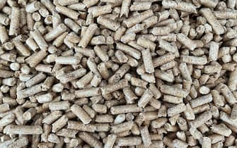 close-up of pellet-like fuel inside a stove