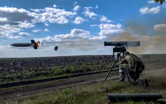 epa10145167 A still image taken from a handout video provided by the Russian Defence Ministry's press service on 29 August 2022 shows a Russian serviceman firing a man-portable anti-tank guided missile 'Kornet' during fights at an undisclosed location in Ukraine. On 24 February 2022 Russian troops entered the Ukrainian territory in what the Russian president declared as a 'Special Military Operation', starting an armed conflict that has provoked destruction and a humanitarian crisis.  EPA/RUSSIAN DEFENCE MINISTRY PRESS S  HANDOUT EDITORIAL USE ONLY/NO SALES