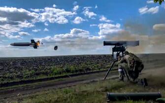 epa10145167 A still image taken from a handout video provided by the Russian Defence Ministry's press service on 29 August 2022 shows a Russian serviceman firing a man-portable anti-tank guided missile 'Kornet' during fights at an undisclosed location in Ukraine. On 24 February 2022 Russian troops entered the Ukrainian territory in what the Russian president declared as a 'Special Military Operation', starting an armed conflict that has provoked destruction and a humanitarian crisis.  EPA/RUSSIAN DEFENCE MINISTRY PRESS S  HANDOUT EDITORIAL USE ONLY/NO SALES