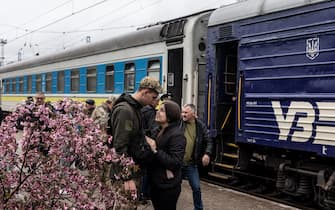 POKROVSK, UKRAINE - MAY 01: A Ukrainian soldier and his girlfriend take leave before she takes a train to Lviv, at railway station in Pokrovsk, Ukraine on May 01, 2023. (Photo by Diego Herrera Carcedo/Anadolu Agency via Getty Images)