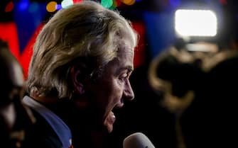 epa10990084 PVV leader Geert Wilders talks to media as he responds to the results of the House of Representatives elections in Scheveningen, Netherlands, 22 November 2023. Dutch voters headed to the polls on 22 November to elect the members of the House of Representatives and a new prime minister, after Netherlands' longest-serving prime minister, Mark Rutte's cabinet collapsed in July.  EPA/REMKO DE WAAL