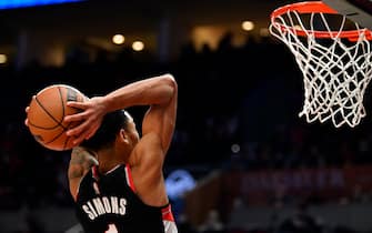 PORTLAND, OREGON - FEBRUARY 12: Anfernee Simons #1 of the Portland Trail Blazers goes for a dunk during the third quarter against the New York Knicks at the Moda Center on February 12, 2022 in Portland, Oregon. The Portland Trail Blazers won 112-103. NOTE TO USER: User expressly acknowledges and agrees that, by downloading and or using this photograph, User is consenting to the terms and conditions of the Getty Images License Agreement. (Photo by Alika Jenner/Getty Images)