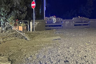 Foto LaPresse 13 agosto 2023 Bardonecchia, Italia - cronaca - Il torrente che attraversa il centro di Bardonecchia &#xe8; esondato nei pressi della piazza del municipio e di via Einaudi: una colata di fango e detriti in pieno centro