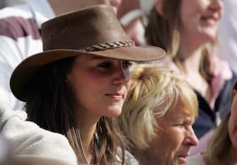 TETBURY, ENGLAND - AUGUST 6: Kate Middleton, girlfriend of Prince William, watches the events in the main arena, on the second day of the Gatcombe Park Festival of British Eventing at Gatcombe Park, on August 6, 2005 near Tetbury, England.(Photo by Matt Cardy/Getty Images) 
