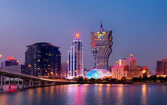 Macao, Macau S.A.R - November 16,2014: Night Macao Skyline, including Casinos such as, The Grand Lisboa and  Wynn. Gambling in Macau has been legal since the 1850s when the Portuguese government legalised the activity in the colony.