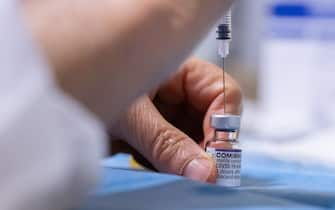 epa09723125 A nurse prepares a dose of Covid 19 vaccine in Bordeaux, France, 02 February 2022. The facility provides adults, and children between 5 and 11 year of age, with either Pfizer or Moderna vaccines. Following the decision of the French Ministry of Health, kids can be vaccinated with the agreement of a single parent.  EPA/CAROLINE BLUMBERG