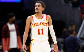 CLEVELAND, OH - DECEMBER 31: Trae Young #11 of the Atlanta Hawks looks on during the game against the Cleveland Cavaliers on December 31, 2021 at Rocket Mortgage FieldHouse in Cleveland, Ohio. NOTE TO USER: User expressly acknowledges and agrees that, by downloading and/or using this Photograph, user is consenting to the terms and conditions of the Getty Images License Agreement. Mandatory Copyright Notice: Copyright 2021 NBAE (Photo by Kamil Krzaczynski/NBAE via Getty Images)