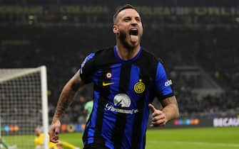 Marko Arnautovic Centre-Forward of Inter and Austria celebrates after scoring his sides first goal during the UEFA Champions League 2023/24 round of 16 first leg match between FC Internazionale and Atletico Madrid at Stadio Giuseppe Meazza on February 20, 2024 in Milan, Italy. (Photo by Jose Breton/Pics Action/NurPhoto via Getty Images)