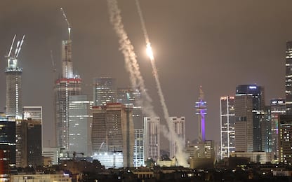 epaselect epa12176279 Israel's Iron Dome air defense system intercepts ballistic missiles fired from Iran over the city of Tel Aviv, Israel, 15 June 2025. Israel's military identified the missiles as being launched from Iran toward Israeli territory in retaliation for overnight airstrikes on Iranian targets.  EPA/ATEF SAFADI