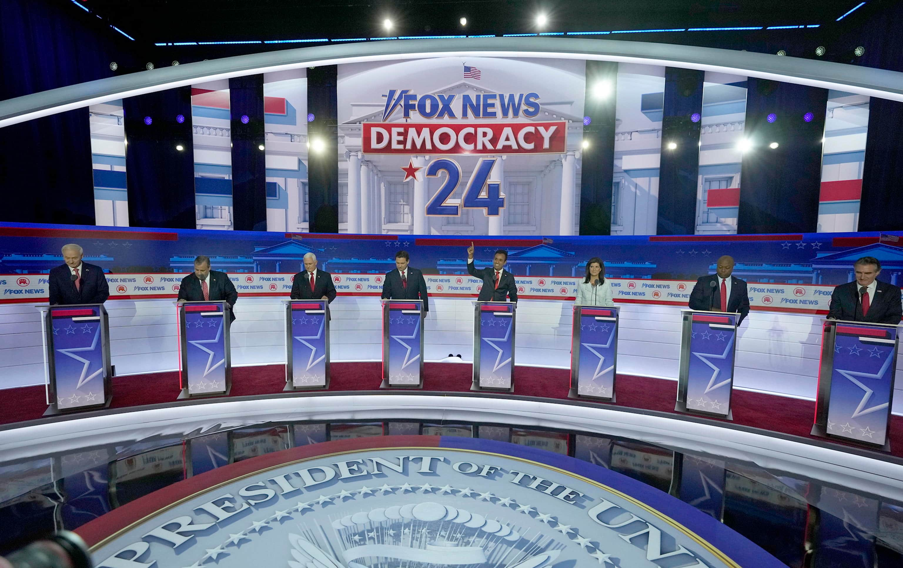 epa10816819 Republican candidates for President Arkansas Governor Asa Hutchinson (L) Former New Jersey Governor Chris Christie (2-L) Former Vice President Mike Pence (3-L) Florida Governor Ron DeSantis (4-L) businessman Vivek Ramaswamy (4-R) Former South Carolina Governor Nikki Haley (3-R) US Senator Tim Scott (2-R) and North Dakota Governor Doug Burgum (R) on stage at the start of the Republican presidential debate, hosted by Fox News and moderated by Bret Baier and Martha MacCallum, at the Fiserv Forum in Milwaukee, Wisconsin, USA, 23 August 2023. A total of eight GOP primary candidates of the 14 declared, are taking part in the debate, with former US President Donald Trump opting not to participate.  EPA/MIKE DESISTI / POOL SHUTTERSTOCK OUT  EDITORIAL USE ONLY/NO SALES