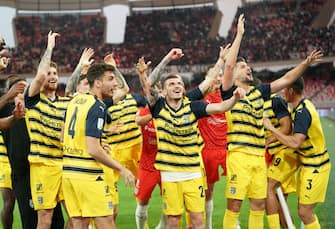 The Parma Calcio players are celebrating their mathematical promotion to Serie A at the end of the Serie B match on the SSC Bari field in Bari, Italy, on May 1, 2024. (Photo by Gabriele Maricchiolo/NurPhoto via Getty Images)