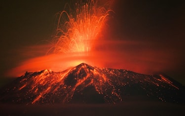 Incandescent materials, ash and smoke are spewed from the Popocatepetl volcano in San Nicolas de los Ranchos, Puebla state, Mexico on May 20, 2023. (Photo by Osvaldo CANTERO / AFP) (Photo by OSVALDO CANTERO/AFP via Getty Images)