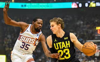 SALT LAKE CITY, UTAH - NOVEMBER 19: Kevin Durant #35 of the Phoenix Suns derfends Lauri Markkanen #23 of the Utah Jazz during the first half of a game at Delta Center on November 19, 2023 in Salt Lake City, Utah. NOTE TO USER: User expressly acknowledges and agrees that, by downloading and or using this photograph, User is consenting to the terms and conditions of the Getty Images License Agreement. (Photo by Alex Goodlett/Getty Images)