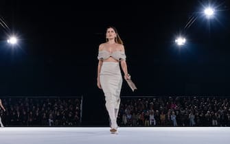 PARIS, FRANCE - JANUARY 18: Laetitia Casta walks the runway during the Jacquemus Menswear Fall/Winter 2020-2021 show as part of Paris Fashion Week on January 18, 2020 in Paris, France. (Photo by Peter White/Getty Images)