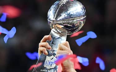 Feb 5, 2017; Houston, TX, USA; New England Patriots quarterback Tom Brady celebrates with the Vince Lombardi Trophy after defeating the Atlanta Falcons 34-38 in Super Bowl LI at NRG Stadium. Mandatory Credit: Robert Deutsch-USA TODAY Sports *** Please Use Credit from Credit Field ***