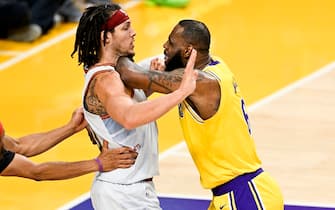 LOS ANGELES, CA - MAY 22: Los Angeles Lakers forward LeBron James, right, and Denver Nuggets forward Aaron Gordon get into a scuffle during the second quarter of game four in the NBA Playoffs Western Conference Finals at Crypto.com Arena on Monday, May 22, 2023 in Los Angeles, CA. (Gina Ferazzi / Los Angeles Times via Getty Images)