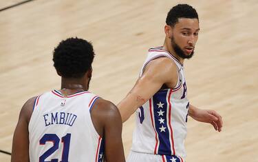 ATLANTA, GEORGIA - JUNE 14:  Ben Simmons #25 of the Philadelphia 76ers reacts towards Joel Embiid #21 during the second half of game 4 of the Eastern Conference Semifinals against the Atlanta Hawks at State Farm Arena on June 14, 2021 in Atlanta, Georgia.  NOTE TO USER: User expressly acknowledges and agrees that, by downloading and or using this photograph, User is consenting to the terms and conditions of the Getty Images License Agreement. (Photo by Kevin C. Cox/Getty Images)