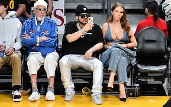 LOS ANGELES, CALIFORNIA - APRIL 09: Lou Adler (L) and Sky Bri (R) attend a basketball game between the Los Angeles Lakers and the Golden State Warriors at Crypto.com Arena on April 09, 2024 in Los Angeles, California. NOTE TO USER: User expressly acknowledges and agrees that, by downloading and or using this photograph, User is consenting to the terms and conditions of the Getty Images License Agreement. (Photo by Allen Berezovsky/Getty Images)