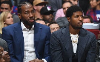 LOS ANGELES, CA - NOVEMBER 6: Kawhi Leonard #2, and Paul George #13 of the LA Clippers look on during the game against the Milwaukee Bucks on November 6, 2019 at STAPLES Center in Los Angeles, California. NOTE TO USER: User expressly acknowledges and agrees that, by downloading and/or using this Photograph, user is consenting to the terms and conditions of the Getty Images License Agreement. Mandatory Copyright Notice: Copyright 2019 NBAE (Photo by Andrew D. Bernstein/NBAE via Getty Images)