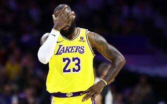 PHILADELPHIA, PENNSYLVANIA - NOVEMBER 27: LeBron James #23 of the Los Angeles Lakers reacts during the first quarter against the Philadelphia 76ers at the Wells Fargo Center on November 27, 2023 in Philadelphia, Pennsylvania. NOTE TO USER: User expressly acknowledges and agrees that, by downloading and or using this photograph, User is consenting to the terms and conditions of the Getty Images License Agreement. (Photo by Tim Nwachukwu/Getty Images)