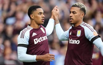 Aston Villa's Jacob Ramsey (left) celebrates with team-mate Morgan Rogers after scoring their side's first goal of the game during the pre-season friendly match at the Bescot Stadium, Walsall. Picture date: Wednesday August 7, 2024.