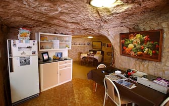 COOBER PEDY, AUSTRALIA - OCTOBER 22:  The kitchen area is seen inside Faye's Underground Home on October 22, 2015 in Coober Pedy, Australia.This three bedroom dugout as locals call underground homes, was hand excavated by Faye Nayler with the help from two of her female friends using picks and shovels. It is still private residence used by the caretakers who run guided tours of the home.  (Photo by Mark Kolbe/Getty Images)