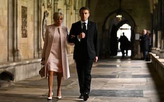 French President Emmanuel Macron and wife Brigitte arriving ahead of the coronation ceremony of King Charles III and Queen Camilla at Westminster Abbey, London. Picture date: Saturday May 6, 2023.