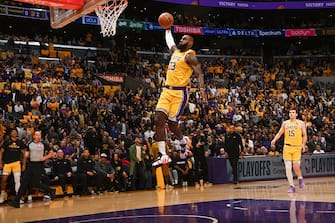 LOS ANGELES, CA - APRIL 25: LeBron James #23 of the Los Angeles Lakers dunks the ball during the game against the Denver Nuggets during Round 1 Game 3 of the 2024 NBA Playoffs on April 25, 2024 at Crypto.Com Arena in Los Angeles, California. NOTE TO USER: User expressly acknowledges and agrees that, by downloading and/or using this Photograph, user is consenting to the terms and conditions of the Getty Images License Agreement. Mandatory Copyright Notice: Copyright 2024 NBAE (Photo by Andrew D. Bernstein/NBAE via Getty Images)
