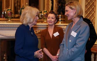 LONDON, ENGLAND - FEBRUARY 18: British Queen Camilla speaks with actors Cate Blanchett and Lesley Manville (C) as she attends a reception for staff, actors and supporters of the National Theatre at Buckingham Palace on February 18, 2025 in London, England. (Photo by Isabel Infantes - WPA Pool/Getty Images)