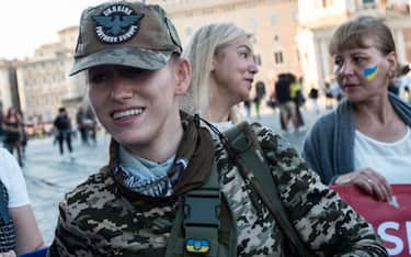 Giulia Schiff, the 23-year-old Italian enlisted in the Ukrainian army who has been fighting with the Ukrainian troops since the beginning of the war, attends the demonstration of the Christian Association of Ukrainians in Italy against Russian aggression  on October 16, 2022 in Rome, Italy. (Photo by Andrea Ronchini/NurPhoto via Getty Images)