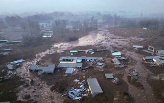 epa11036709 An aerial photo shows the mudslide-struck Caotan Village in Minhe Hui and Tu Autonomous County of Haidong City, Qinghai Province, China, 19 December 2023. Eleven people have been confirmed dead in northwest China's Qinghai Province, after a 6.2-magnitude earthquake jolted the neighboring Gansu Province late Monday evening, according to local authorities. The epicenter was located just 5 km from the border between the two provinces. Many areas in Qinghai have felt strong tremors.  The United States Geological Survey (USGS) listed an alternate reading of 5.9 magnitude for the earthquake.  EPA/XINHUA / Zhang Hongxiang CHINA OUT / UK AND IRELAND OUT  /       MANDATORY CREDIT  EDITORIAL USE ONLY  EDITORIAL USE ONLY  EDITORIAL USE ONLY