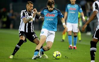 Udinese's Roberto Pereyra (L) and Napoli's Khvicha Kvaratskhelia in action during the Italian Serie A soccer match Udinese Calcio vs SSC Napoli at the Friuli - Dacia Arena stadium in Udine, Italy, 4 May 2023. ANSA / GABRIELE MENIS