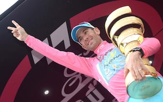 Italian rider of Astana Team Vincenzo Nibali celebrates on the podium after winning the Giro d\