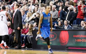 PORTLAND, OR - DECEMBER 7: Dallas Mavericks shooting guard Monta Ellis (11) celebrates his game winning shot at the buzzer with 1.9 second remaining during the Dallas Mavericks 108-106 victory over the Portland Trail Blazers at the Moda Center on December 7, 2013 in Portland, Oregon. NOTE TO USER: User expressly acknowledges and agrees that, by downloading and or using this photograph, User is consenting to the terms and conditions of the Getty Images License Agreement. (Photo by Chris Elise/Getty Images)