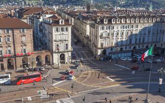 TURIN, ITALY - OCTOBER 22, 2014: Tourists visiting Piazza Castello, the central baroque square