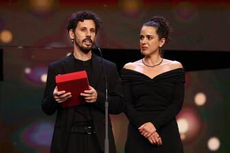 BERLIN, GERMANY - FEBRUARY 25: Leandro Koch and Paloma Schachmann speak on stage after winning the GWFF Best First Feature Award for "The Klezmer Project" at the award ceremony of the 73rd Berlinale International Film Festival Berlin at Berlinale Palast on February 25, 2023 in Berlin, Germany. (Photo by Sebastian Reuter/Getty Images)