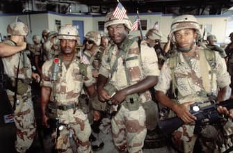 (Original Caption) Saudi Arabia: (24th): Soldiers of the 24th Infantry prepare to leave to Saudi Arabia in support of Operation Desert Shield
