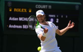 LONDON, ENGLAND - JUNE 22: Andreas Seppi of Italy plays a forehand against Aidan McHugh of Great Britain in their Mens' Qualifying Singles match during Day 3 of Wimbledon Championships Qualifying at Wimbledon Qualifying & Community Sports Centre on June 22, 2022 in London, England. (Photo by Justin Setterfield/Getty Images)