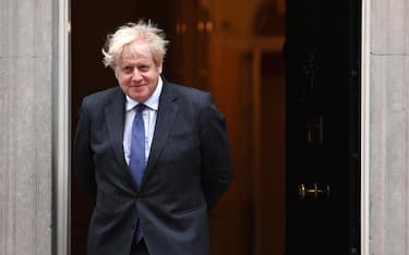 epa09278847 British Prime Minister Boris Johnson looks on ahead of a meeting with Crown Prince Salman bin Hamad Al Khalifa of Bahrain at 10 Downing Street in London, Britain, 17 June 2021.  EPA/ANDY RAIN