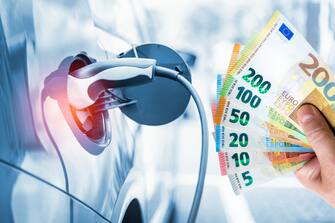 Concept for finances in connection with electromobility, such as financing, subsidy programs, subsidies, saving, tax advantages, insurance, saving, refueling, refueling with electricity