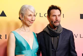 US visual artist Alexandra Grant (L) and US actor Keanu Reeves (R) arrive for the MOCA Gala 2024 at the Geffen Contemporary at MOCA (Museum of Contemporary Art) in Los Angeles, April 13, 2024. (Photo by Michael Tran / AFP) (Photo by MICHAEL TRAN/AFP via Getty Images)