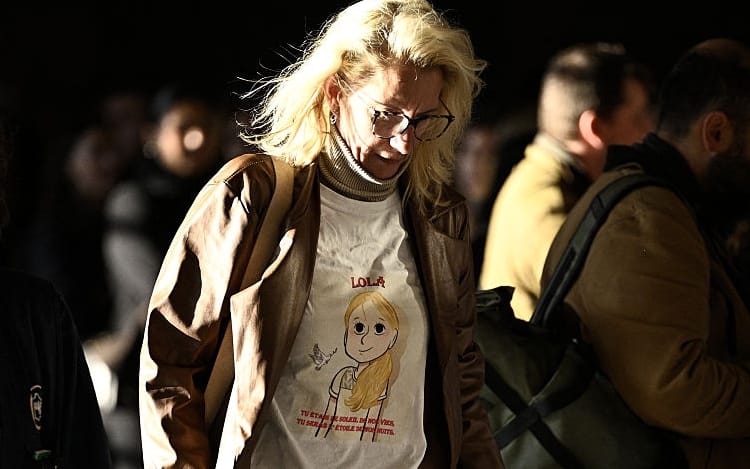 Delphine Daviet (R), mother of Lola, arrives at the Paris Assize Court for the trial of Dahbia Benkired, accused of raping, torturing, and killing Lola Daviet, a 12-year-old girl, in 2022, on October 17, 2025. (Photo by JULIEN DE ROSA / AFP) (Photo by JULIEN DE ROSA/AFP via Getty Images)          