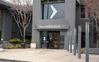 SANTA CLARA, CA - MARCH 10: A person leaves from Silicon Valley Bank headquarters in Santa Clara, California, United States on March 10, 2023.US regulators have shut down Silicon Valley Bank (SVB) amid its sudden collapse, the Federal Deposit Insurance Corporation (FDIC) announced in a statement on Friday. (Photo by Tayfun Coskun/Anadolu Agency via Getty Images)