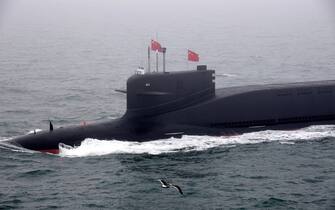 (190423) -- QINGDAO, April 23, 2019 -- A new type of nuclear submarine of the Chinese People s Liberation Army (PLA) Navy takes part in a naval parade staged to mark the 70th founding anniversary of the PLA Navy on the sea off Qingdao, east China s Shandong Province, on April 23, 2019. ) CHINA-QINGDAO-PLA NAVY-70TH ANNIVERSARY-PARADE (CN) LixZiheng PUBLICATIONxNOTxINxCHN