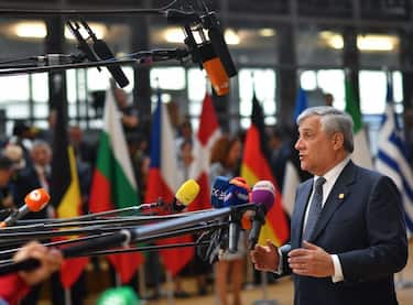 European Parliament President Antonio Tajani speaks to journalists as he arrives to take part in an European Union leaders' summit focused on migration, Brexit and eurozone reforms on June 28, 2018 at the Europa building in Brussels. - The two-day meeting in Brussels is expected to be dominated by deep divisions over migration, with German Chancellor saying the issue could decide the fate of the bloc itself. (Photo by Ben STANSALL / AFP)        (Photo credit should read BEN STANSALL/AFP via Getty Images)