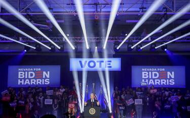 US President Joe Biden, center, during a campaign event at Pearson Community Center in Las Vegas, Nevada, US, on Sunday, Feb. 4, 2024. Biden implored Nevada voters to make Republican frontrunner Donald Trump a "loser," part of a two-day swing designed to gain an advantage in a battleground state he hopes to win again later this year. Photographer: Ian Maule/Bloomberg via Getty Images