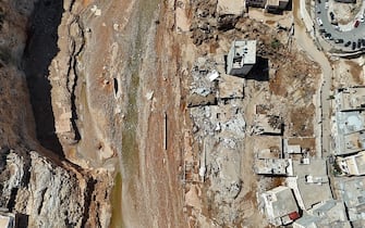 DERNA, LIBYA - SEPTEMBER 13: An aerial view of the devastation in disaster zones after the floods caused by the Storm Daniel ravaged the region in Derna, Libya on September 13, 2023. The death toll from devastating floods in Libya's eastern city of Derna has risen to 6.000 and thousands of people are still missing, as the Government of National Unity in Libya announced. (Photo by Muhammad J. Elalwany/Anadolu Agency via Getty Images)