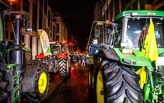 Tractors in the Rue de la Loi - Wetstraat at a protest action in the European district in Brussels, organized by general farmers union ABS on Thursday 01 February 2024. ABS (Algemeen Boerensyndicaat) take part in the farmers' protests across Europe as they demand better conditions to grow, produce and maintain a proper income. BELGA PHOTO HATIM KAGHAT (Photo by HATIM KAGHAT / BELGA MAG / Belga via AFP) (Photo by HATIM KAGHAT/BELGA MAG/AFP via Getty Images)